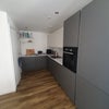 Photo 3: Dishwasher, microwave, fridge,washing machine / storage space. 