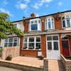 Photo 4: House Exterior