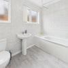 Photo 13: Bath and toilet