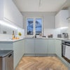 Photo 6: Fully-fitted designer kitchen – whip up your cravings or host epic foodie nights!