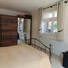 Photo 3: Large double wardrobe with hanging rail, drawers and cubby holes