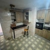 Photo 7: Kitchen equipped with white goods