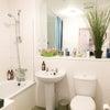 Photo 4: Shared bathroom with bath and shower