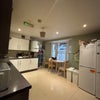 Photo 6: Downstairs kitchen