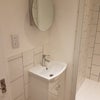 Photo 5: vanity sink basin and mirror