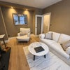 Photo 4: Cosy lounge at front of house