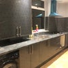 Photo 4: kitchen with gas stove and oven.