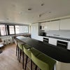 Photo 3: The shared kitchen area