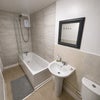 Photo 11: 3 of 3 spacious shared bathrooms
