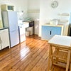 Photo 2: The kitchen/living room