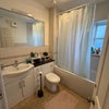 Photo 4: Bathroom with bathtub 