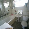 Photo 5: … with exclusive access to the bathroom.