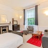 Photo 3: Living room (bed to be removed haha)