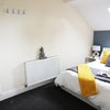 Photo 3: Quiet, quirky shaped top floor room