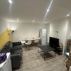 Photo 8: Spacious Common Living Room with TV