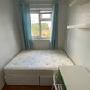 Photo 3: the room has additional storage space under the bed