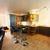 Photo 1: Kitchen and dining area