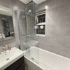 Photo 2: Toilet with Bath Tub