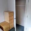 Photo 3: Built in wardrobe space plus Large cupboard with shelves