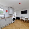 Photo 17: Communal Kitchen 