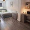 Photo 2: Room 5 - Bed, Chest and Desk