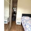 Photo 6: bedroom with large double wardrobe and shelving unit 