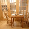 Photo 2: Furnished shared living space & kitchen