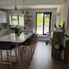 Photo 5: Kitchen and view of garden shed and deck 