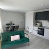 Photo 6: The kitchen with dining space and living space
