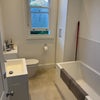 Photo 5: First floor bathroom (across from available bedroom)