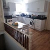 Photo 2: Kitchen & Main entrance
