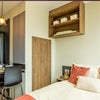 Photo 1: Sleeping area & breakfast bar
