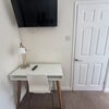 Photo 3: Desk and tv