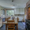 Photo 2: Family kitchen with seating for ten 
