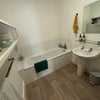 Photo 9: Bathroom (unpictured: bathroom 2 and shower)