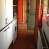 Photo 7: Private entrance and washing machine