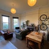 Photo 2: Living Room with Dining