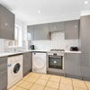 Photo 7: Kitchen shared with two other people 