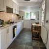 Photo 3: Main kitchen with washing machine and hoboven