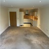 Photo 2: Living room with connected kitchen