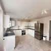 Photo 1: Kitchen/living area