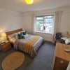Photo 3: NOTE: This Room 2 photo is enhanced by AI