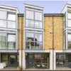Photo 1: Front of house (middle one)