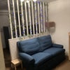 Photo 4: Living part of room with TV.