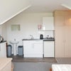 Photo 4: Kitchenette and wash basin