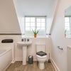 Photo 3: Only two tenants share this large, luxury bathroom, which has been freshly decorated.
