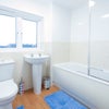 Photo 2: Only two/three tenants share this large, luxury bathroom, which has been freshly decorated.