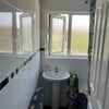 Photo 3: Bathroom with bath and shower 