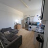 Photo 2: Shared living room & kitchen