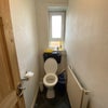 Photo 11: Shared Toilet